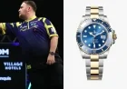 Luke Littler takes aim with his new Rolex