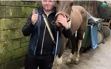 'Brutal' criminal who bit ex-girlfriend and kept machine gun in home, jailed