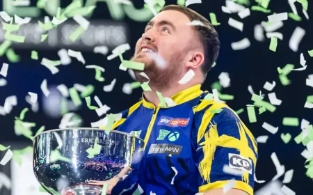 Littler wins Grand Slam and secures world number one ranking