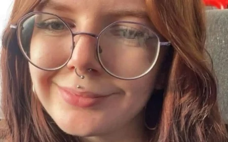 Man held after woman found dead in Wales boat yard