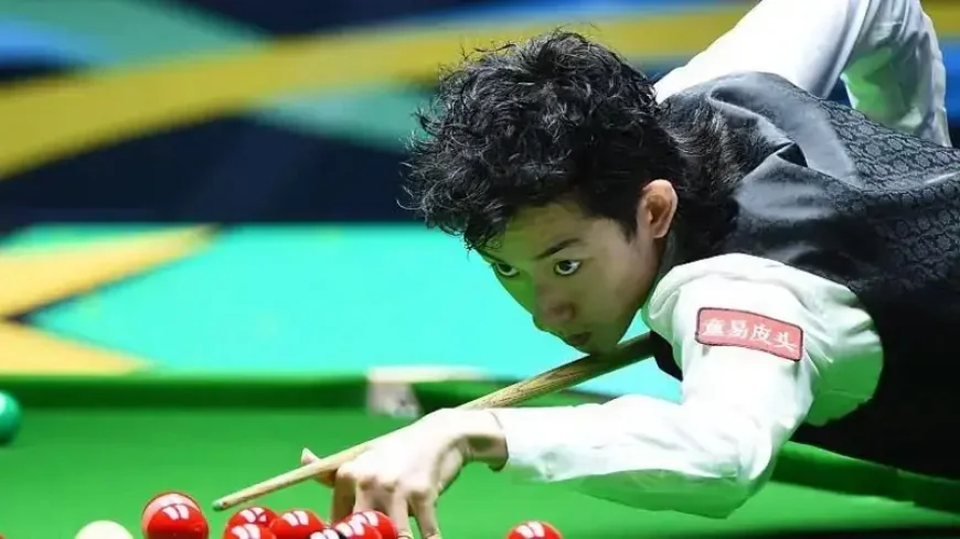 Wu clinches first title after beating Higgins