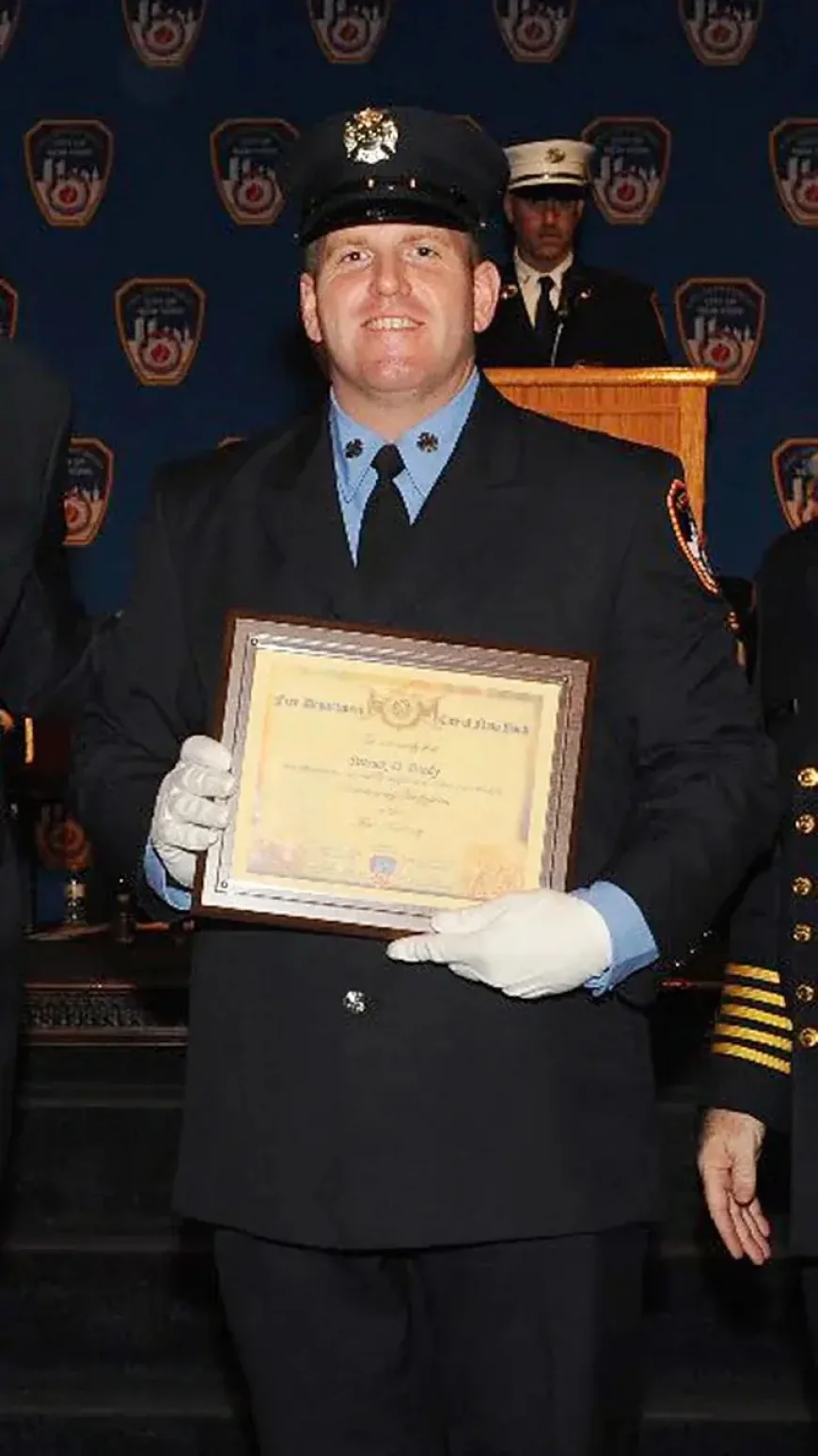 A New York firefighter died while battling a fire on a Brooklyn rooftop