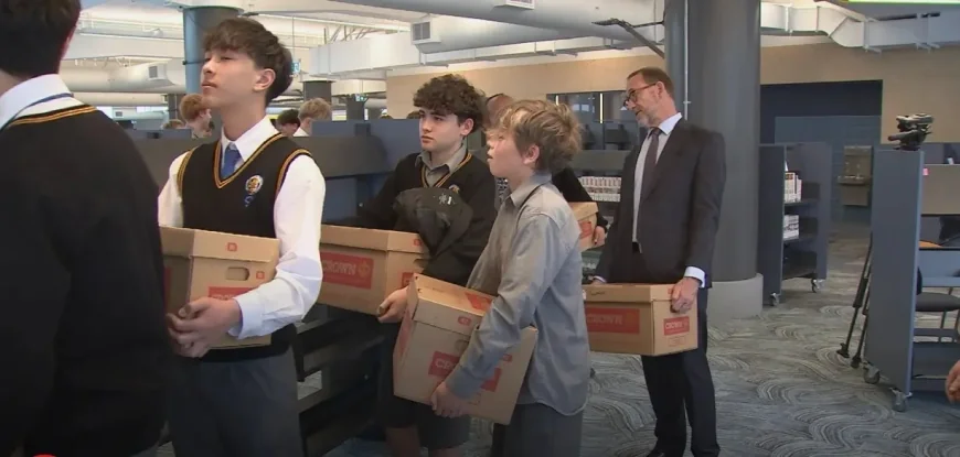 Students help restock Wellington’s Central Library again